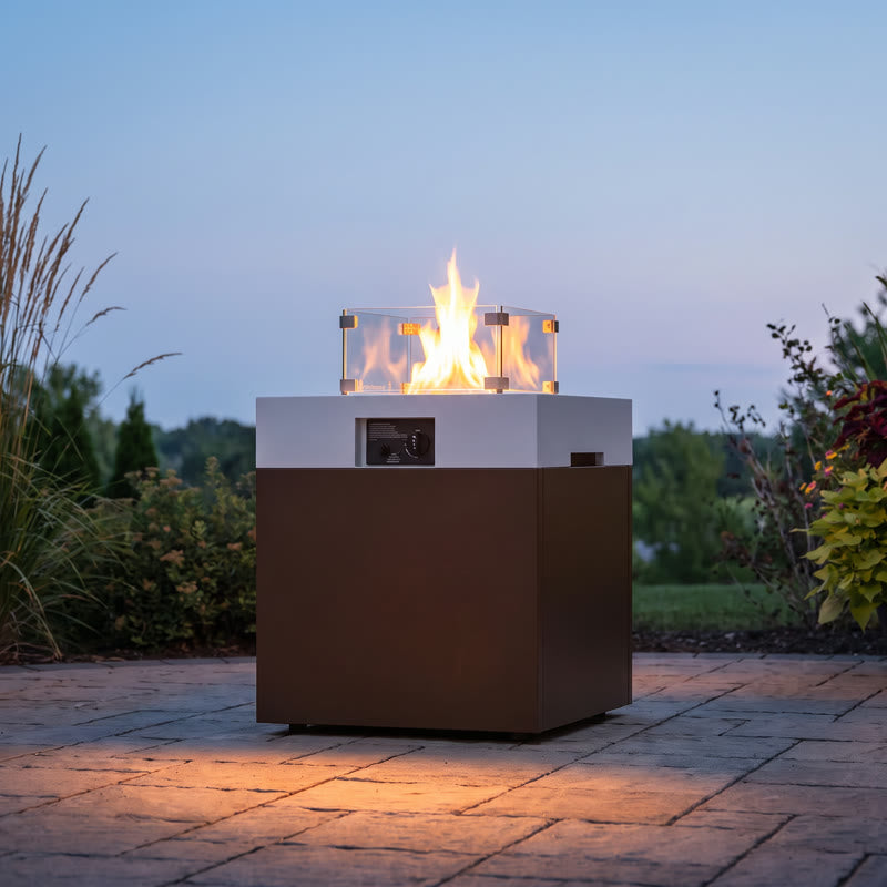 Fire pit table lit at dusk