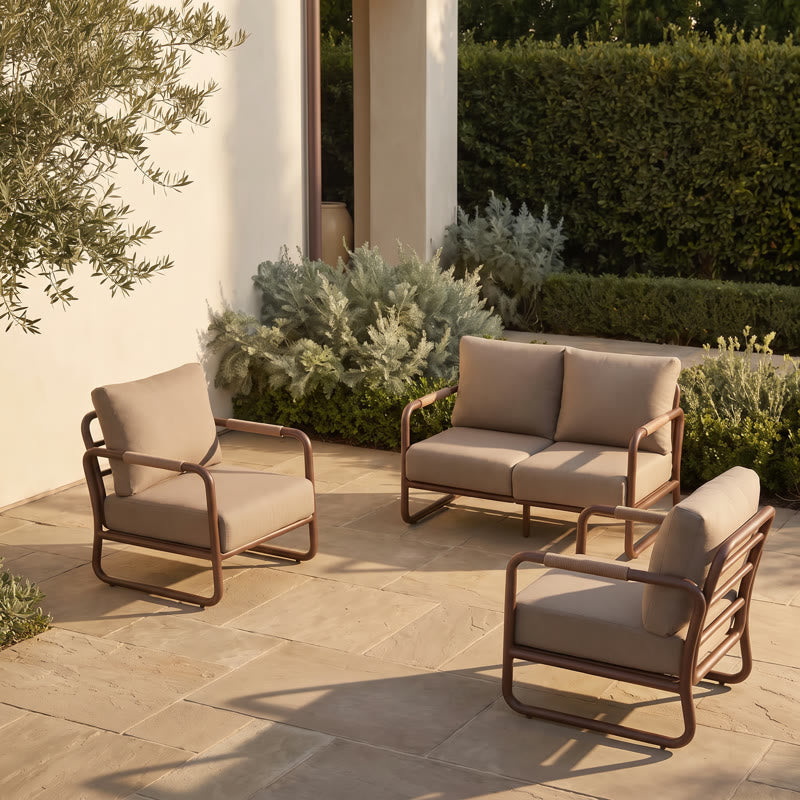 Aluminum patio conversation set on a backyard patio