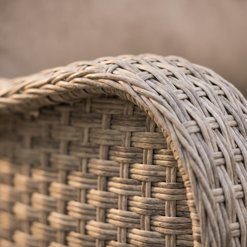 Close-up of grey all-weather wicker weave on a swivel chair